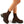 Bruine soklaarzen met dikke zool, gedragen door model. Trendy damesmode, comfortabele pasvorm, perfect voor herfst- en winteroutfits.