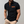 Zwarte herenpolo met oranje accenten, korte mouwen en geruit patroon. Perfect voor casual en stijlvolle outfits. Comfortabele pasvorm.
