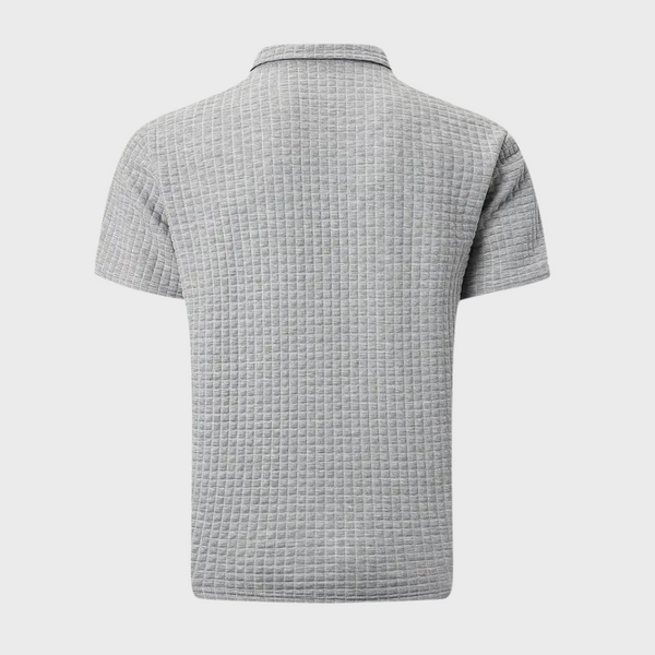Lichtgrijs herenpoloshirt met korte mouwen, geruit patroon en klassieke kraag. Perfect voor casual en zakelijke outfits. Hoogwaardige kwaliteit.