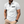 Witte herenpolo met korte mouwen, zwarte borstzak, stijlvolle casual look, geschikt voor zomer, gemaakt van ademende stof, ideaal voor modebewuste mannen.