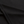 Zwarte katoenen stof close-up met fijne textuur en nette stiksels, ideaal voor kleding en interieur. Hoogwaardige kwaliteit en duurzaam materiaal.