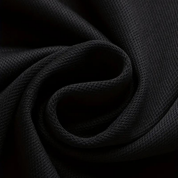 Zwarte stof close-up, gedetailleerd geweven textuur, ideaal voor kleding en interieur, hoogwaardige textielmaterialen, elegant en duurzaam.