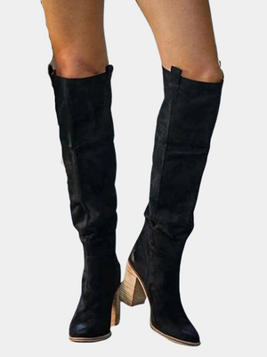 Zwarte suède dameslaarzen met hoge hak, knielengte, modieus design. Perfect voor herfst- en wintermode. Comfortabele en stijlvolle laarzen.