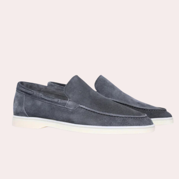 Donkergrijze suède loafers met witte zool, stijlvolle herenschoenen, casual en elegant design, perfect voor dagelijks gebruik en formele gelegenheden.