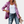 Roze pailletten blazer voor dames, gecombineerd met een witte top en gescheurde jeans. Modieuze outfit voor feestelijke gelegenheden.