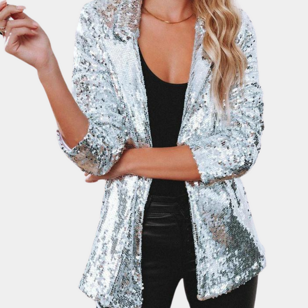 Zilveren pailletten blazer voor dames, glanzend en stijlvol, perfect voor feestelijke gelegenheden. Modieuze kleding, opvallende feestoutfit.