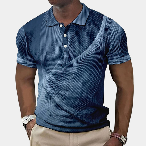 Blauwe herenpolo met korte mouwen en abstract patroon, gemaakt van ademende stof. Perfect voor casual en formele gelegenheden.