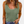 Groene ribgebreide tanktop voor dames, casual zomerstijl, gedragen met jeans. Perfect voor trendy, comfortabele mode.