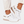 Witte dames sneakers met sleehak, perforaties en gouden accenten. Comfortabele en trendy schoenen voor dagelijks gebruik. Perfect voor casual outfits.