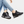 Zwarte dames sneakers met sleehak, geperforeerd leer, comfortabele pasvorm. Modieuze schoenen voor dagelijks gebruik. Perfect bij casual jeans.