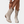 Beige suède cowboylaarzen met perforaties, lage hak en puntige neus. Stijlvolle dameslaarzen voor casual en trendy outfits.
