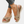 Beige sandalen met sleehak, kruislings bandjes en espadrille zool, gedragen met jeans. Comfortabele zomerschoenen voor dames.
