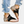 Zwarte sandalen met open teen en enkelband, gedragen met gescheurde jeans. Trendy zomerschoenen voor dames, casual en comfortabel.