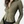 Groene ribgebreide blouse met lange mouwen, knoopsluiting en kraag, gedragen door model. Trendy damesmode, casual chique stijl.