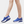 Blauwe dames sneakers met luchtkussen zool, ademend mesh bovenwerk en slip-on design. Comfortabele sportschoenen voor dagelijks gebruik.