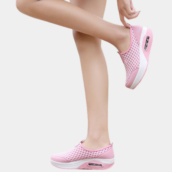 Roze dames sneakers met luchtkussen zool, ademend mesh ontwerp, comfortabele pasvorm, ideaal voor casual en sportieve outfits.