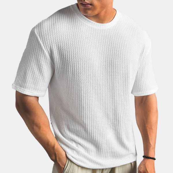 Witte heren T-shirt met textuur, korte mouwen en ronde hals. Comfortabel en stijlvol, ideaal voor casual en zomerse outfits.