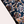 Donkerblauwe sjaal met kleurrijk paisley-patroon, ideaal voor modieuze herenkleding. Hoogwaardige stof, perfect voor stijlvolle accessoires.