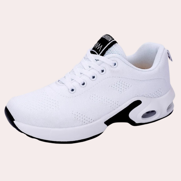 Witte sportschoen met ademend mesh, lichtgewicht ontwerp en dempende zool. Perfect voor hardlopen en dagelijks gebruik. Unisex sneaker.
