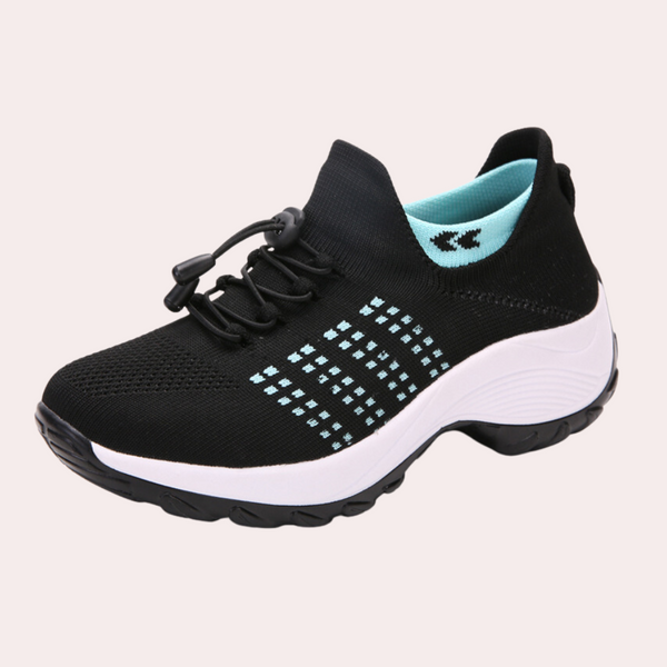 Zwarte sportschoen met witte zool en turquoise accenten, ademend mesh, elastische vetersluiting, ideaal voor hardlopen en fitness.