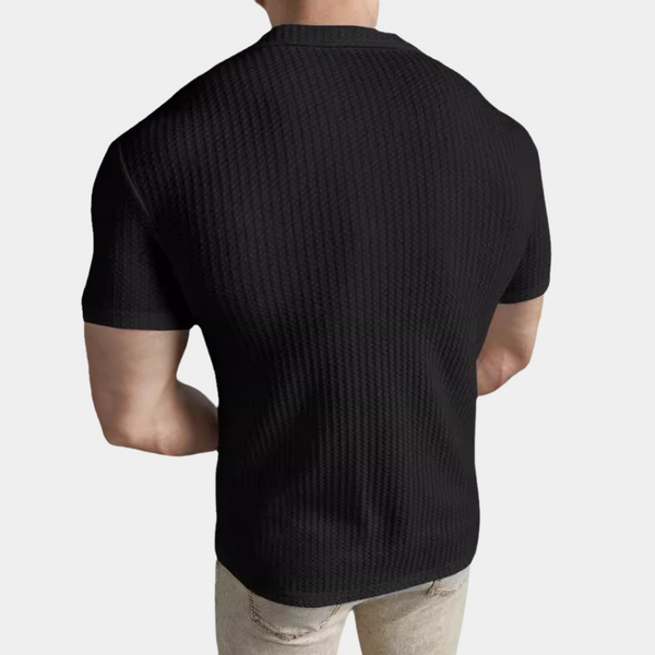 Zwarte heren T-shirt met textuur, korte mouwen en ronde hals. Perfect voor casual en stijlvolle outfits. Comfortabele pasvorm, moderne look.