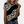 Vrouw draagt trendy T-shirt met luipaardprint en zwarte strepen, casual stijl, perfect voor modieuze dameskleding.