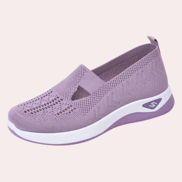 Lichtpaarse damesschoen met ademend mesh, comfortabele zool en slip-on design. Perfect voor dagelijks gebruik en wandelingen.