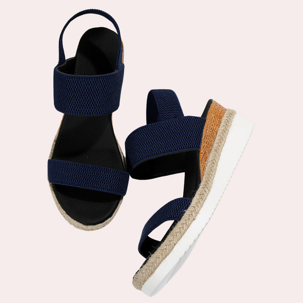 Blauwe dames sandalen met elastische bandjes, espadrille zool en witte rubberen zool. Comfortabele zomerschoenen voor casual en trendy outfits.