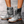 Grijze leren veterlaarzen voor dames op natte straat, stijlvolle en duurzame schoenen, perfect voor herfstmode en casual outfits.