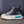 Zwarte leren sneaker met dikke witte zool, turquoise detail en veters. Modieuze hoge sneaker voor casual en sportieve outfits.