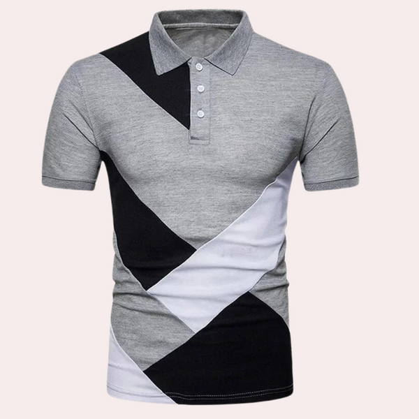 Grijze polo met korte mouwen, geometrisch zwart-wit patroon, herenmode, casual stijl, comfortabele pasvorm, trendy design.
