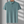 Groene poloshirt met geometrisch driehoekpatroon, korte mouwen en knoopsluiting. Stijlvolle herenkleding, perfect voor casual en zakelijke gelegenheden.