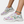 Witte sneakers met bloemenprint, dikke zool en turquoise enkelbandje. Modieuze damesschoenen, comfortabel en trendy voor dagelijks gebruik.