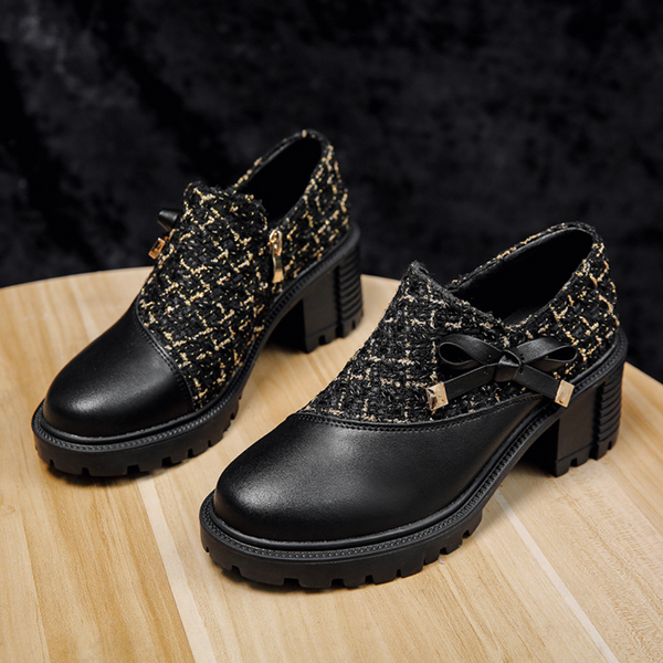 Zwarte dames enkellaarsjes met blokhak, tweed stof en strikdetail, stijlvolle schoenen voor herfst en winter, perfect voor casual en formele outfits.