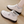 Witte hoge sneakers met zwarte zool en grijze gestreepte voering, merklabel 