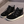Zwarte suède herensneakers met witte zool, vetersluiting en geruite binnenvoering. Stijlvolle casual schoenen voor dagelijks gebruik.