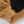 Teddy fleece stof in bruin en zwart, zachte textuur, close-up. Ideaal voor warme kleding en accessoires. Hoogwaardige kwaliteit, knuffelbaar materiaal.