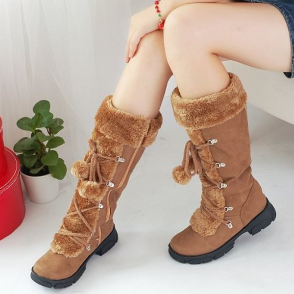 Bruine dameslaarzen met bontvoering en veters, comfortabele winterlaarzen, trendy en warm, ideaal voor koude seizoenen.