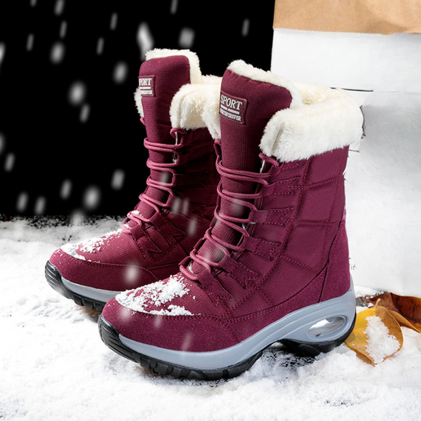 Bordeaux winterlaarzen met bontvoering, sneeuwbestendig, antislip zool, ideaal voor koude weersomstandigheden. Perfecte keuze voor dames.