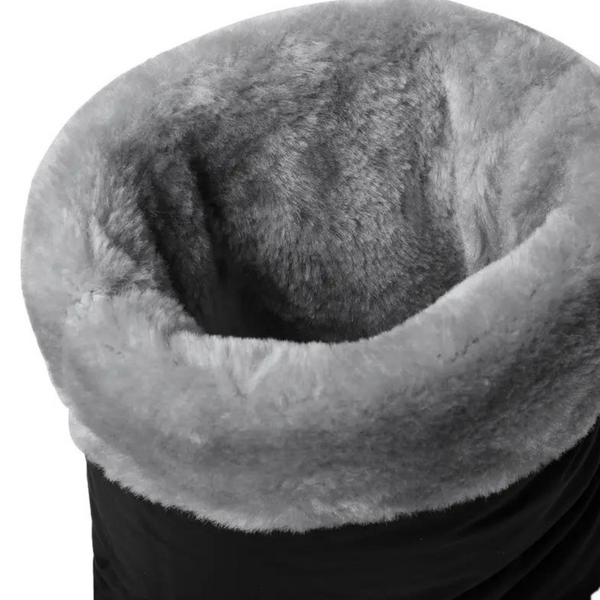 Zwarte laars met grijze, zachte voering van imitatiebont, ideaal voor wintermode. Comfortabele en warme dameslaars voor koude dagen.