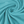 Turquoise katoenen stof in close-up, gedraaid in een spiraalpatroon. Perfect voor naaiprojecten, kleding en interieurdecoratie.