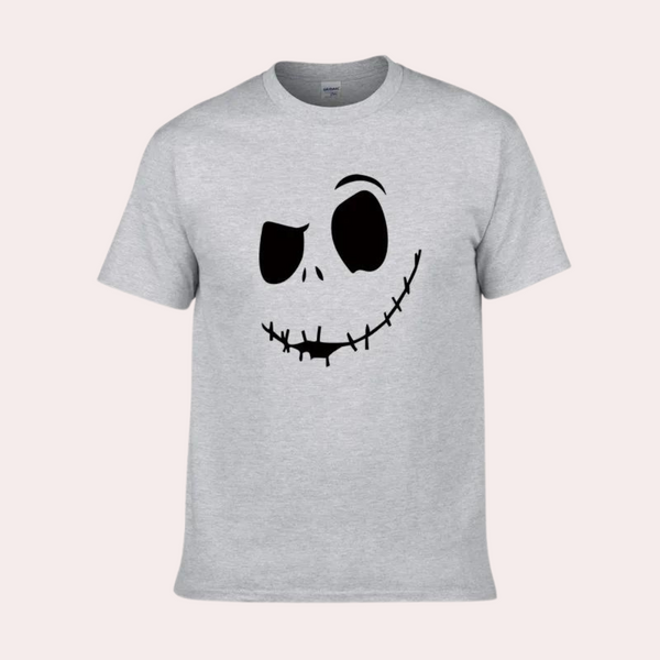 Grijze T-shirt met zwart, grijnzend schedelontwerp, unisex, casual stijl, perfect voor Halloween, gemaakt van katoen, comfortabele pasvorm.