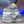Grijze chunky sneakers op witte doos, moderne streetwear-stijl, dikke zool, casual mode, unisex schoenen, trendy design, comfortabele pasvorm.