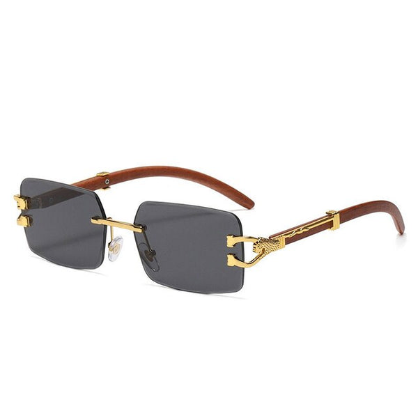 Luxe metalen zonnebril met blauwgradiënt lenzen, randloos en vierkant ontwerp. Geschikt voor mannen en vrouwen. Designer zonnebril.