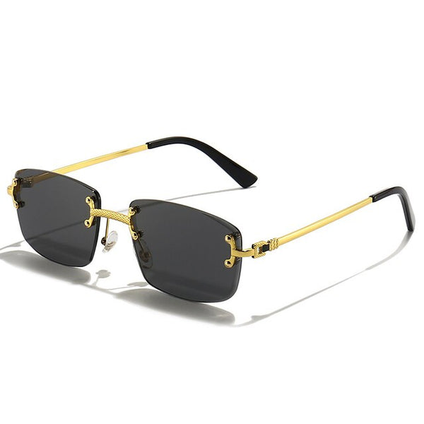 Luxe designer zonnebril met randloos vierkant ontwerp, gouden metalen frame en donkere lenzen. Modieuze unisex zonnebril voor mannen en vrouwen.