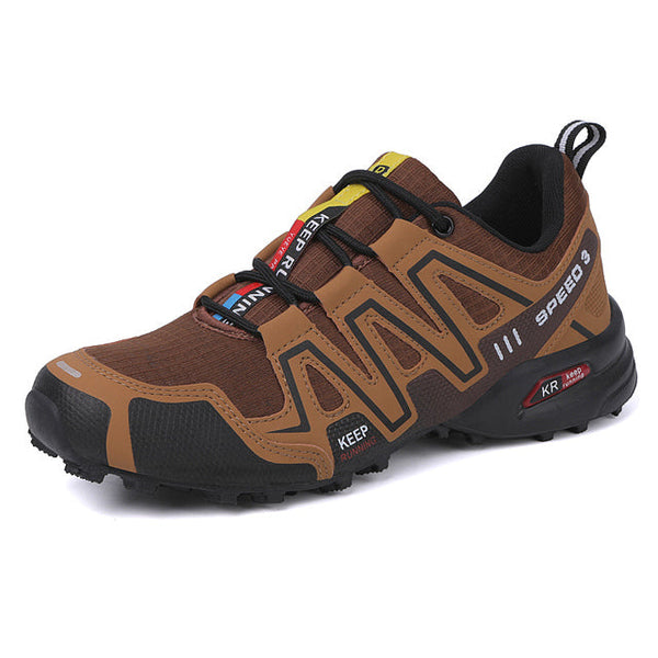 Bruine herenschoen voor bergbeklimmen, ademend mesh, antislip zool, geschikt voor wandelen en outdoor activiteiten. Sportieve en duurzame stijl.