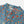 Blauw overhemd met kleurrijk bloemenpatroon, knoopsluiting en opstaande kraag. Perfect voor modieuze, casual outfits. Hoogwaardige katoenen stof.