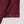 Bordeauxrode trui met textuur, close-up van mouw en ribboord. Moderne herenkleding, stijlvol en comfortabel. Perfect voor herfstmode.