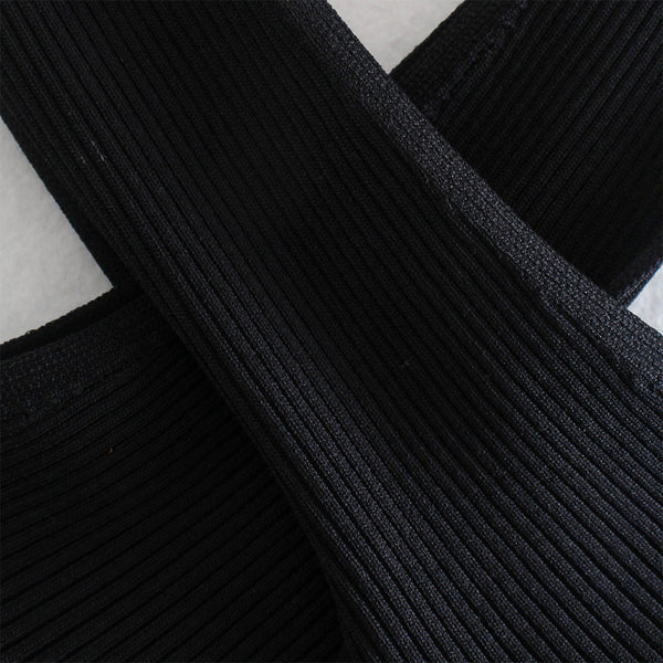 Zwarte geribbelde elastische band, close-up textuur. Ideaal voor kleding, accessoires en DIY-projecten. Hoogwaardige elastiek voor veelzijdig gebruik.