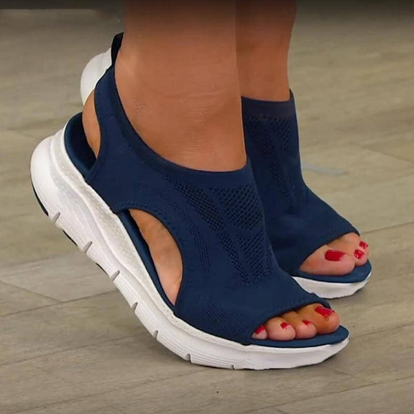Donkerblauwe comfortabele sandalen met open teen en witte zool, ideaal voor dagelijks gebruik. Perfecte zomerschoenen voor dames, stijlvol en praktisch.